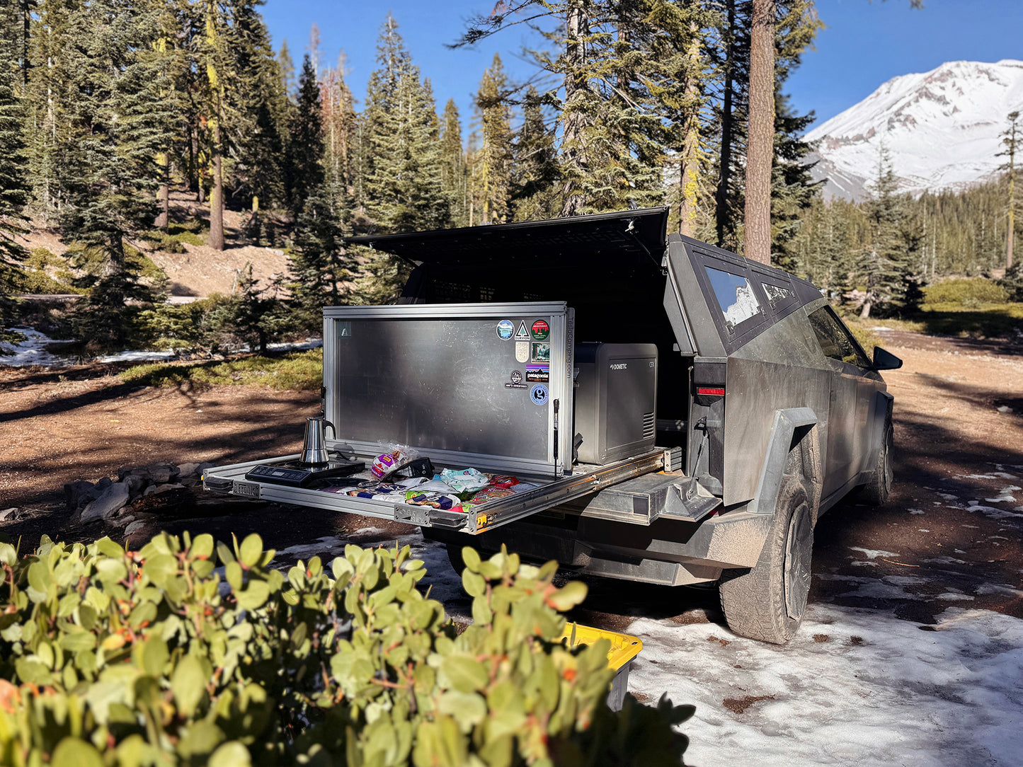 CyberSlide in Tesla Cybertruck bed with camping and outdoor adventure equipment