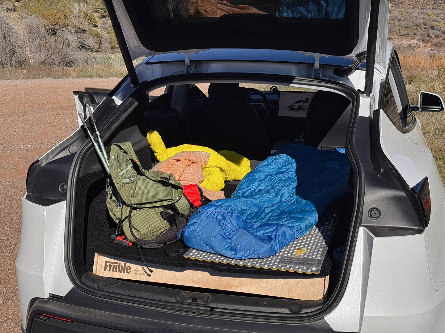 Tesla Model Y camping with Camper Kit Ultralite minimalist sleeping setup outdoors