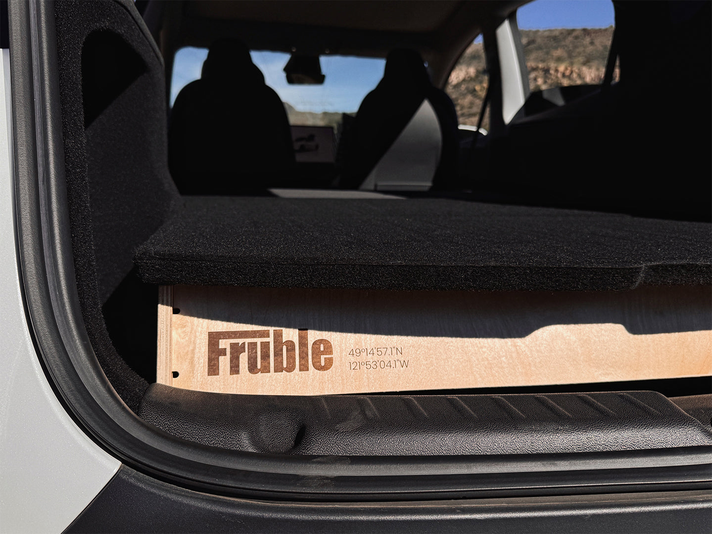 Camper Kit Ultralite low-profile design in Tesla Model Y showing minimal height